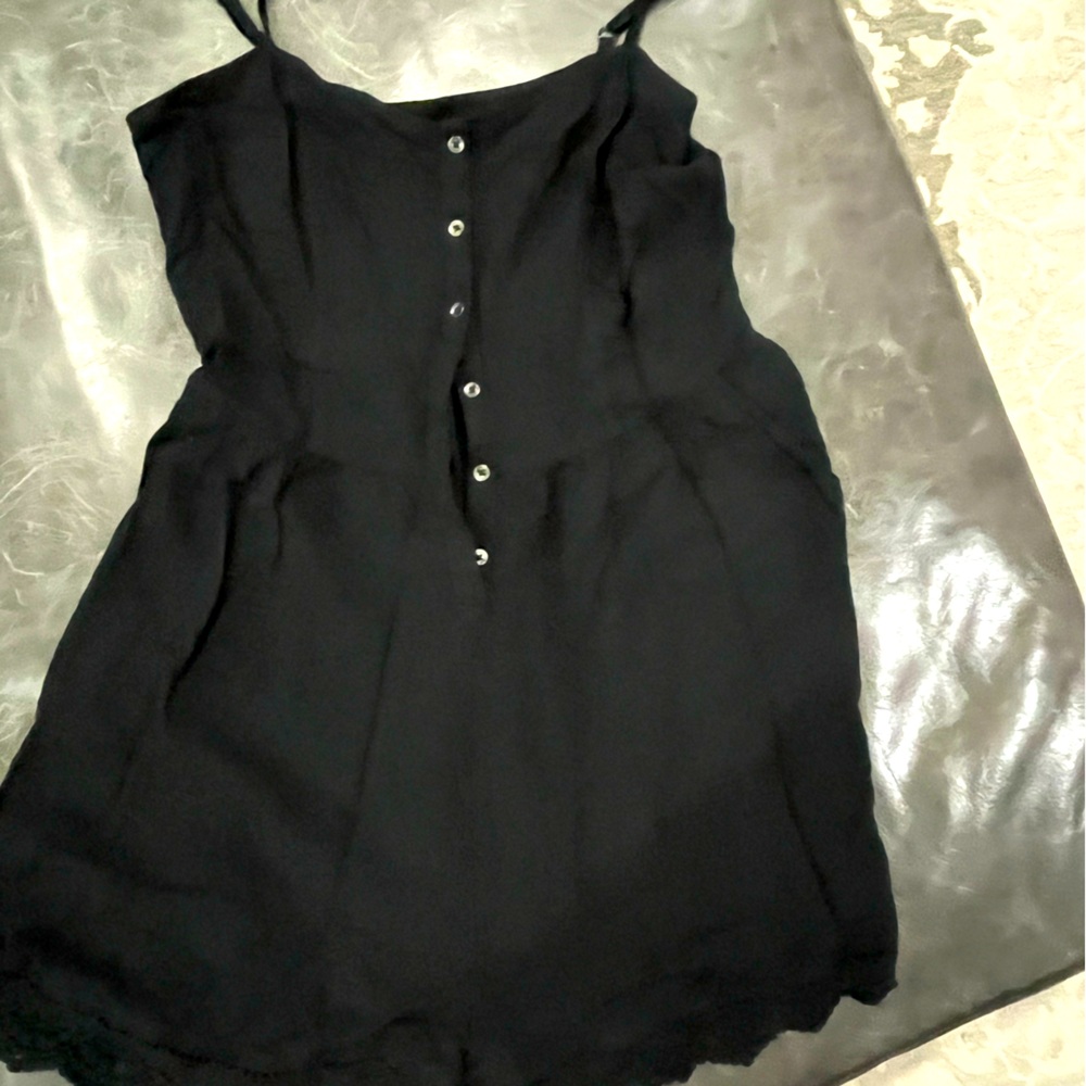 EXPRESS black romper with lace accent, button front accent, adjustable straps.
